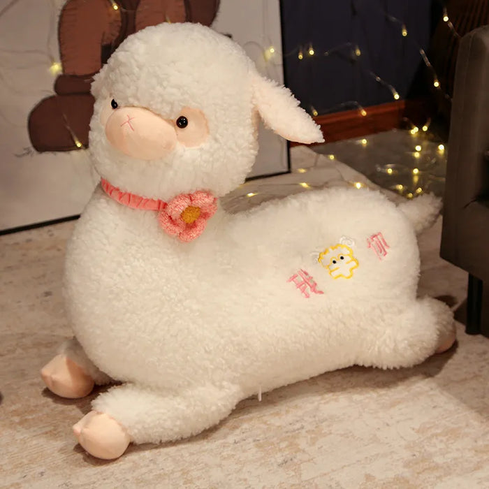 Almohada de felpa de alpaca gigante y adorable acostada